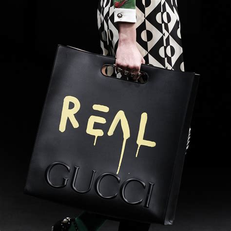 Gucci runway slogans